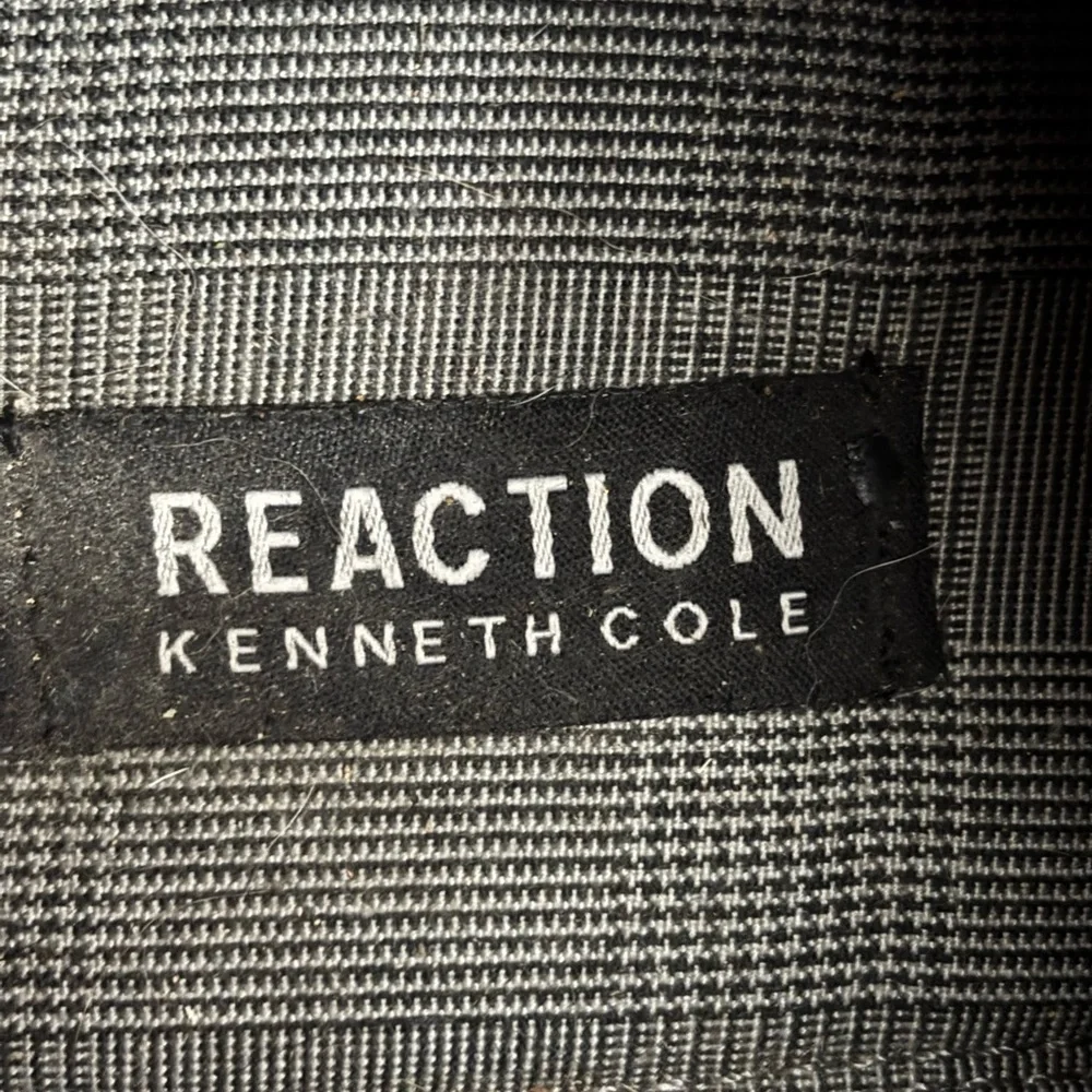 Kenneth Cole sleek versatile